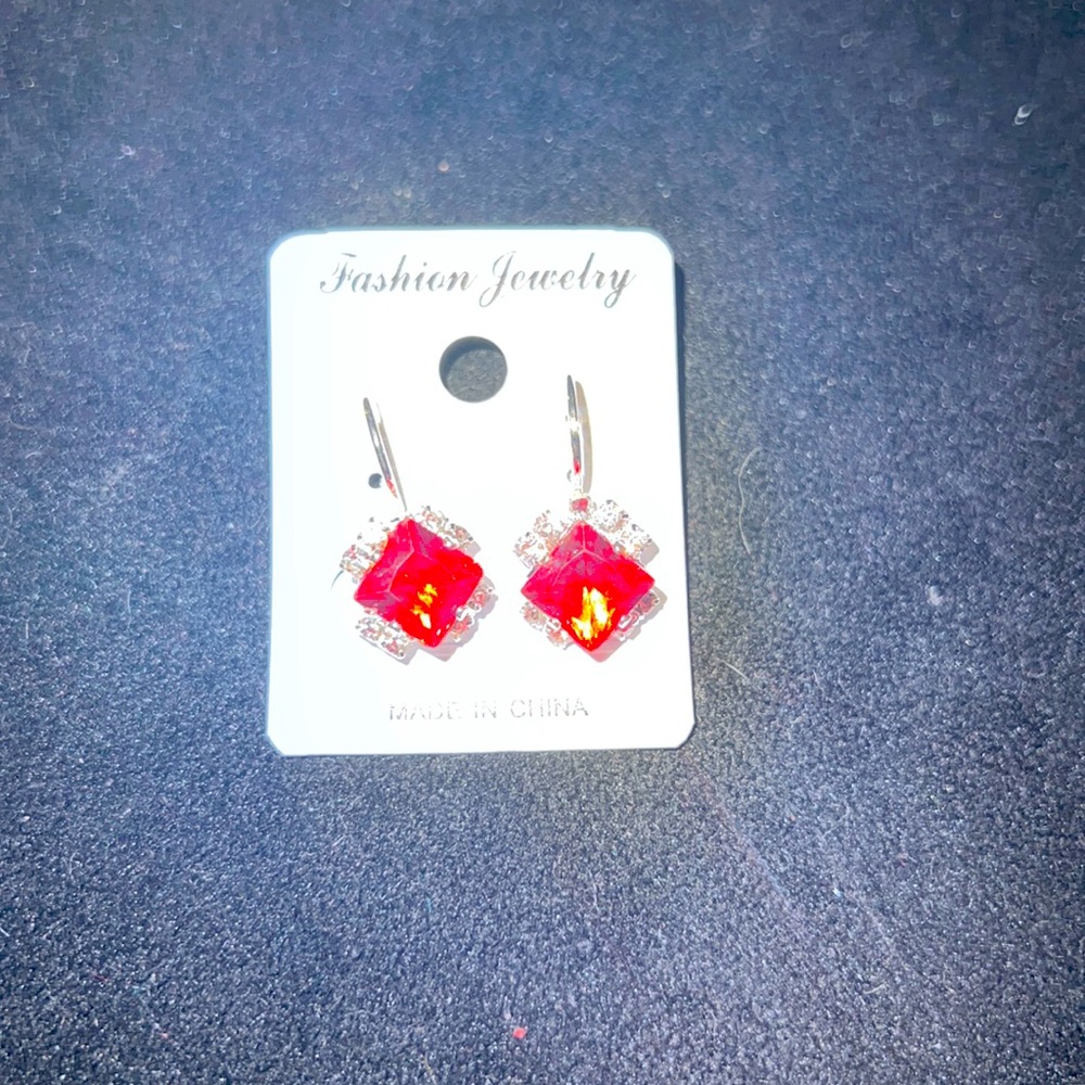 Gorgeous Ruby and diamond crystal earrings, pierced.
